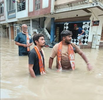 25062025-bajarangdal-surat-rain-disaster